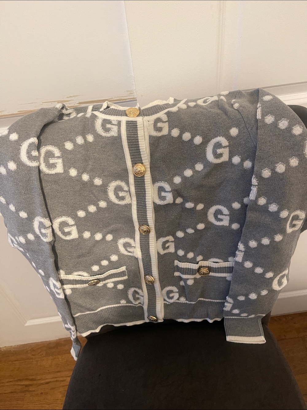 Gray and white Gucci sweater